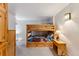 Bedroom featuring bunk beds, built-ins, and natural light at 434 Kings Crown Rd, Breckenridge, CO 80424