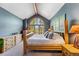 Spacious main bedroom with vaulted ceiling and arched window at 434 Kings Crown Rd, Breckenridge, CO 80424