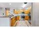Bright kitchen features wood cabinets, stainless appliances, and grey counter tops at 434 Kings Crown Rd, Breckenridge, CO 80424