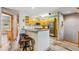 Kitchen features stainless appliances, wood cabinets, and peninsula bar at 434 Kings Crown Rd, Breckenridge, CO 80424