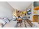 Bright living room featuring a fireplace and wood accents throughout the space at 434 Kings Crown Rd, Breckenridge, CO 80424
