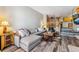 Cozy living room with sectional, decorative rug and view of the kitchen at 434 Kings Crown Rd, Breckenridge, CO 80424