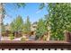Charming neighborhood view showcases well-maintained homes, mature trees, and landscaped yards from the balcony at 434 Kings Crown Rd, Breckenridge, CO 80424