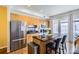 Modern kitchen showcasing stainless steel appliances, a breakfast bar, and stylish countertops at 2100 N Humboldt St # 207, Denver, CO 80205