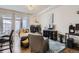 Cozy living room with fireplace, modern decor, and a comfortable seating area with natural light at 2100 N Humboldt St # 207, Denver, CO 80205