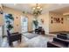 Inviting lobby with comfortable seating, stylish light fixture, and decorative artwork at 2100 N Humboldt St # 207, Denver, CO 80205