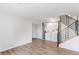 Basement featuring the laundry area, staircase, and wood-look floors at 5101 E 122Nd Cir, Thornton, CO 80241