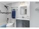 Updated bathroom features a shower-tub combination, modern vanity and updated fixtures at 5101 E 122Nd Cir, Thornton, CO 80241