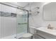 Bathroom featuring a glass shower door, modern vanity and fixtures at 5101 E 122Nd Cir, Thornton, CO 80241