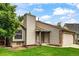 Charming single-Gathering home with siding and stone accents, featuring a well-kept lawn at 5101 E 122Nd Cir, Thornton, CO 80241