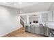 Modern kitchen featuring updated stainless steel appliances and beautiful light fixtures at 5101 E 122Nd Cir, Thornton, CO 80241