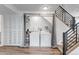 Finished basement featuring modern washer and dryer hookups and a staircase at 5101 E 122Nd Cir, Thornton, CO 80241