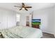 Comfortable main bedroom with a ceiling fan and ensuite bathroom at 5101 E 122Nd Cir, Thornton, CO 80241