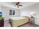 Spacious main bedroom features natural light, wood-look floors, and modern decor at 5101 E 122Nd Cir, Thornton, CO 80241