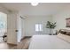 Bright bedroom featuring white walls, hardwood floors, and a closet at 5147 Saint Paul St, Denver, CO 80216
