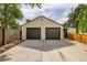 Detached two-car garage with updated doors, providing ample parking at 5147 Saint Paul St, Denver, CO 80216