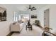 Cozy living room featuring stylish seating, natural light, and a view to the outside at 5147 Saint Paul St, Denver, CO 80216