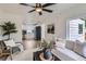 Bright living room featuring modern decor, an open floor plan and wood flooring at 5147 Saint Paul St, Denver, CO 80216