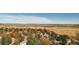 Wonderful aerial view showing a neighborhood by a lake and an open field at 10886 E Crestline Cir, Englewood, CO 80111