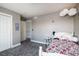 Inviting bedroom features a bed with cozy linens and neutral decor, perfect for relaxing and restful nights at 3685 Roberts St, Mead, CO 80542