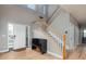 Bright foyer with hardwood floors, staircase and access to other rooms at 3685 Roberts St, Mead, CO 80542