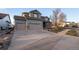 Charming two-story home with stone accents and a three-car garage at 3685 Roberts St, Mead, CO 80542