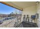 Private balcony offering views of the surrounding area and parking lot at 2225 S Jasmine St # 304, Denver, CO 80222