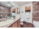 Clean bathroom with neutral tile, updated vanity, and bathtub at 2225 S Jasmine St # 304, Denver, CO 80222