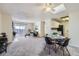 Spacious living area with dining space, open to kitchen and balcony at 2225 S Jasmine St # 304, Denver, CO 80222