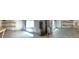 Unfinished basement features white wall and concrete flooring with water heater and HVAC System at 4788 Laurelglen Ln, Highlands Ranch, CO 80130