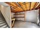 Unfinished basement with storage shelving and exposed ceiling at 4788 Laurelglen Ln, Highlands Ranch, CO 80130