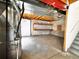 Unfinished basement with storage shelving for ample storage space at 4788 Laurelglen Ln, Highlands Ranch, CO 80130
