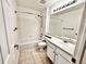 Clean bathroom featuring a combined shower and tub, updated vanity, and tile flooring at 4788 Laurelglen Ln, Highlands Ranch, CO 80130