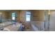 Large primary bathroom showcasing a dual sink vanity and separate tub and shower perfect for relaxing at 4788 Laurelglen Ln, Highlands Ranch, CO 80130