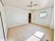 Large bedroom with neutral carpet, ceiling fan and a window allowing for plenty of natural light at 4788 Laurelglen Ln, Highlands Ranch, CO 80130