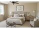Stylishly furnished bedroom with a plush bed, modern decor, and ambient lighting at 4788 Laurelglen Ln, Highlands Ranch, CO 80130
