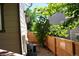 Side yard with privacy fence and central air conditioning unit at 4788 Laurelglen Ln, Highlands Ranch, CO 80130