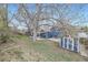 Overhead view of a spacious backyard including a patio, shed, and lawn at 9921 Wigham St, Thornton, CO 80229