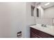 Bathroom with wood cabinet and sink at 9921 Wigham St, Thornton, CO 80229