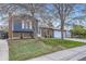 Attractive two-story home featuring a brick and siding exterior, complemented by mature trees and landscaping at 9921 Wigham St, Thornton, CO 80229