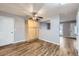 View of the eat-in kitchen, showcasing ample cabinetry and hardwood floors, great for Gathering meals at 9921 Wigham St, Thornton, CO 80229