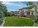 The large grassy backyard with mature trees makes this the perfect oasis to relax at 7053 S Shawnee St, Aurora, CO 80016