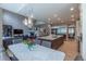 Open concept dining area adjacent to kitchen and living room, perfect for entertaining at 7053 S Shawnee St, Aurora, CO 80016