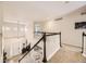 View from the second floor landing overlooking the foyer and front entrance at 7053 S Shawnee St, Aurora, CO 80016