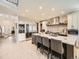 Spacious kitchen featuring a large island, stainless steel appliances, and an open layout at 7053 S Shawnee St, Aurora, CO 80016