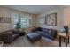 Comfortable living room with natural light, stylish furniture, and elegant decor at 7053 S Shawnee St, Aurora, CO 80016