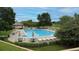 Enjoy the community pool with lounge chairs, tables, umbrellas, and a nearby bath house at 7053 S Shawnee St, Aurora, CO 80016