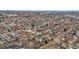 Panoramic aerial shot showcases a dense residential area with mature trees and varied rooftops at 460 S Sherman St, Denver, CO 80209