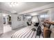 Finished basement bedroom with carpet, view of a brick fireplace, and furnishings at 460 S Sherman St, Denver, CO 80209