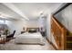 Finished basement bedroom with carpet, a staircase, and furnishings at 460 S Sherman St, Denver, CO 80209